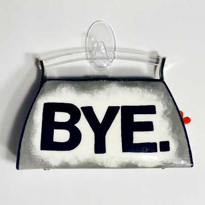 Box clutch with handpainted word, "bye", on a white background that fades into silver.