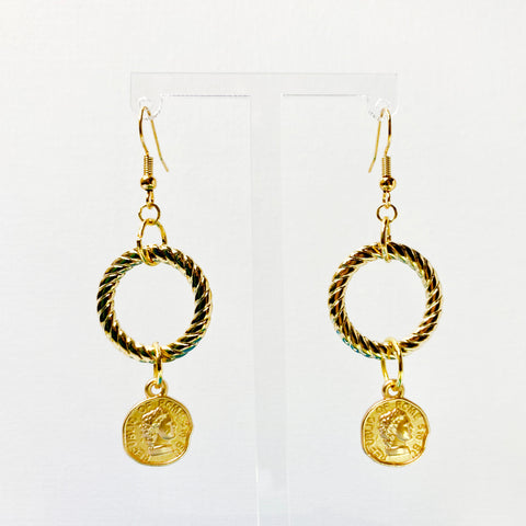 Gold-toned hanging earrings with gold-plated ring and roman coin. 