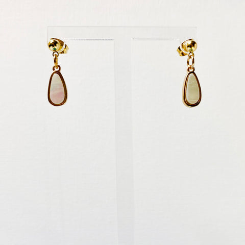 Gold studs with dangling marble teardrop charms.