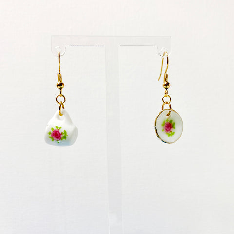 Hanging earrings with a mini plate and cup with floral decal accents. 